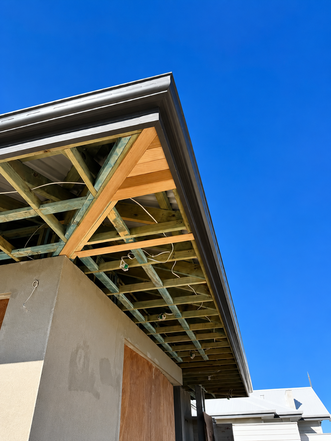 Before: cedar-lined eaves project